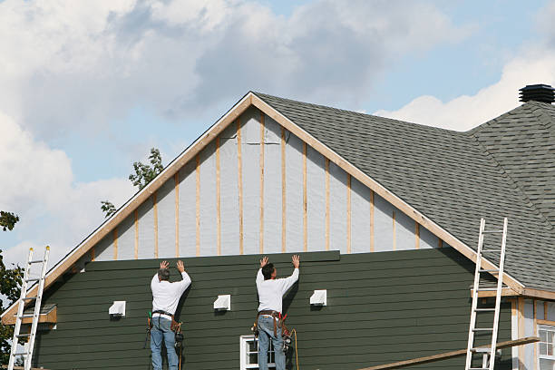 Professional Siding Replacement technician working in Girard, PA